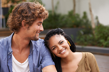 Image showing Couple, lovers and together in happiness, love and smile outdoors in garden, backyard and patio. Male person, girlfriend and partners with diversity, affection and bonding for summer in Jamaica