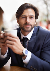Image showing Thinking male person, cafe and latte for business, thought and relax when outdoor on break in winter for warmth. Professional man, cappuccino and suit for tea, job and coffee shop or restaurant