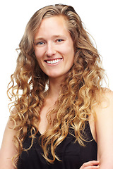 Image showing Woman, portrait and smile in studio, hair and confidence for textures on white background. Happy female person, curly hairstyle and satisfaction for treatment, cosmetics and proud of conditioner