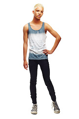 Image showing Portrait, teen boy and confident in studio for fashion, trendy, edgy and style with pride. Teenager, model and stylish outfit on white background for casual, clothes and cool with attitude or glare