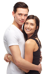 Image showing Portrait, couple and hug in studio, love and affection on isolated white background. Smile, romantic relationship or husband and wife for honeymoon, bonding and happy together while embracing