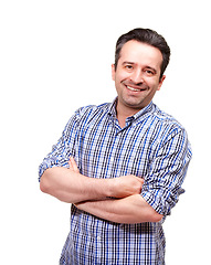 Image showing Man, portrait and shirt in studio with arms folded for confidence, fashion and style with pride. Male person, face and relax with happiness for trendy, clothing and smile on white background