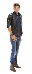 Image showing Handsome man, portrait and fashion with leather jacket or cool clothing on a white studio background. Attractive male person, punk or young dude with denim jeans for casual outfit, jewelry or style