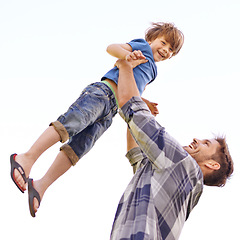 Image showing Father, son and playing together in white background, happy child and dad in studio. Family time, parent and toddler are enjoying or smile or man, holding and lifting kid for fun and bonding