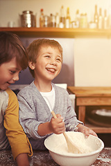 Image showing Happy, kitchen and children baking in home with ingredients, flour and mixing bowl for cookie dough. Utensils, siblings and learning for holiday, pastry recipe and dessert cake by lens flare.