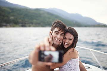 Image showing Couple, vacation and selfie on boat, ocean and Bali for getaway with smile and affectionate. Man, woman and love for phone, happy and travel on yacht and summer holiday by mountain and water
