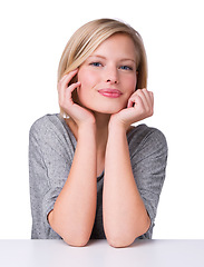 Image showing Woman, smile and studio with daydreaming, portrait or face for planning. Model, nostalgia or ideas with contemplating, wondering or playful or thoughtful pose and sitting isolated on white background