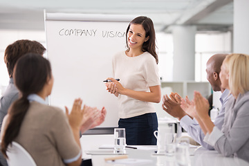 Image showing Woman leadership, clapping and presenting for company vision, planning and discussion in office. Female boss, boardroom and colleagues in management meeting, applauding or celebrating new ideas