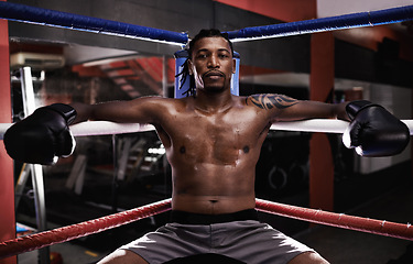 Image showing Boxing male person, ring and gym for sport, match and portrait with braids and shirtless with gloves. Black male boxer, sport and training gear for mma, exercise and fitness for workout and fight