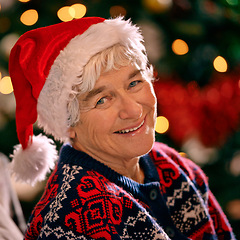 Image showing Senior woman, portrait and tree for Christmas, old and grandma and smile with happiness. House, elderly female person and joy for holiday in living room, season and closeup for celebration in home