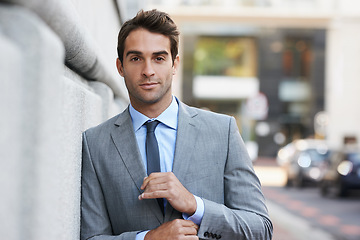 Image showing Happy, pride and portrait of businessman in city with positive, good and confident attitude. Smile, suit and handsome professional male accountant with classy and elegant style in urban town.