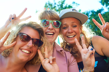 Image showing Peace, group and selfie outdoor for holiday, photography and women for portrait. Nature, friends and blue sky in summer, vacation and happy with getaway and excited with a smile and finger gesture