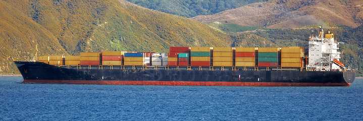 Image showing Shipping, container and ocean for transportation, logistics and supply chain industry, worldwide and global delivery. Freight export, cargo and banner of a ship travelling on sea for commercial trade