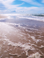 Image showing Waves, ocean and landscape of beach in Hawaii for tropical holiday, vacation and travel destination. Nature, island and seashore, sea and water in summer weekend for location, background and horizon