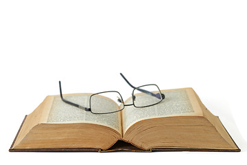 Image showing Old, book or glasses with manuscript of knowledge, ancient literature or history on a white studio background. Closeup of historic novel or spectacles for vintage scripture or reading on mockup space