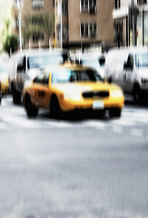 Image showing Blur, traffic and taxi in street with city background, landscape and transportation for travel outdoor. Building, cab car driving in road and metro with motion or moving, journey or trip in New York