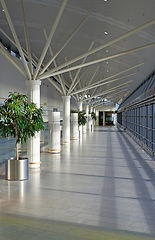 Image showing Empty, airport and building for travel, architecture and interior design with corridor or lobby background. Inside for international journey, opportunity and transportation at airline in Copenhagen