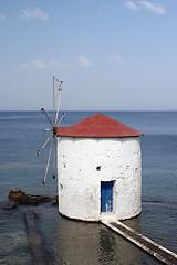 Image showing white mill and blue