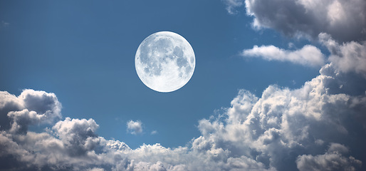 Image showing Moon, cloud and blue sky with light for twilight, fog or weather of natural scenery in nature. Moonlight, sphere or full circle with cloudy fog, lunar or bright orb of glowing hemisphere in the air