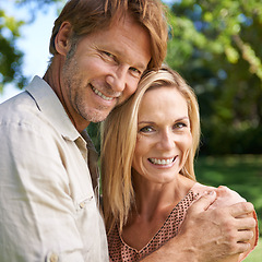 Image showing Couple, portrait and hug in garden for romance, together and commitment in marriage or relationship. People, love and bonding on outdoor date in park, support and embrace on summer holiday