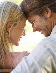 Image showing Couple, forehead touch and care in outdoors, love and connection in relationship or security. Mature people, back and date in nature or romance in garden, closeup and vacation or support on holiday