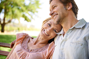 Image showing Happy, bench and portrait of couple in park for bonding, relationship and love outdoors. Nature, marriage and face of man and woman embrace for romance, relax and commitment on weekend together