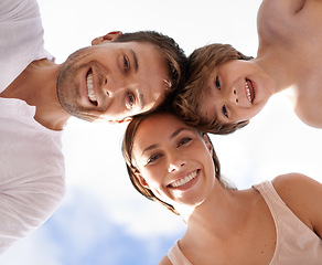 Image showing Summer, sky and low angle of family in portrait with love, care and support child with happiness. Holiday, travel or kid with parents on vacation in Florida and smile from below with mom and dad