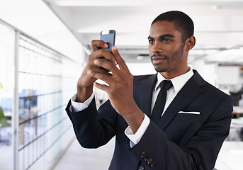 Image showing Businessman, smile and selfie with smartphone in office for memory of job interview, confidence or social media post. Man, photography and company with pride for career, business or startup at work