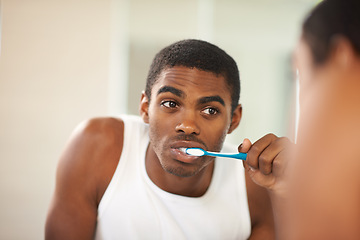 Image showing Bathroom, black man and brushing teeth for oral hygiene, cleaning and toothbrush for grooming. Male person, self care and morning for whitening of tooth, health and fresh breath from mouth for guy