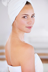 Image showing Portrait, beauty and skincare of woman in bathroom for wellness at home. Face, towel and natural cosmetics of young female person with spa facial treatment, dermatology or glow for healthy body care