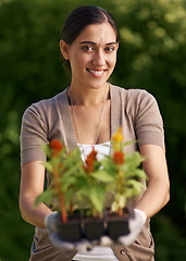 Image showing Nature, gardening and portrait of woman with flower plant in backyard for agriculture, botany and landscaping in nursery Environment, face and female person for ecology, growth and sustainability.
