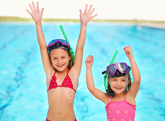 Image showing Excited, cheers and portrait of kids at swimming pool, ready for adventure on vacation. Holiday, resort and friends celebrate with toys for fun or children with goggles, gear and fashion for water