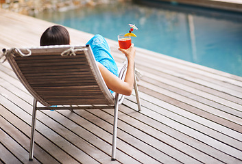 Image showing Woman, lounge chair and cocktail on summer vacation for fun cheers, relax and drink at hotel pool. Female tourist, alcoholic beverage or toast to peace, me time and luxury holiday resort in Maldives