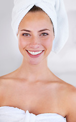Image showing Portrait, beauty and skincare of happy woman in towel for wellness in bathroom at home. Face, natural and cosmetics of female person with spa facial treatment, dermatology or glow for healthy skin