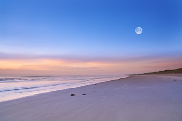 Image showing Beach, blue sky and ocean, landscape with nature and environment, moon and sand with travel destination. Horizon, waves and seascape with natural background, tropical location or island for holiday