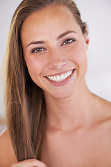 Image showing Portrait, beauty and hair care of happy woman, skincare and wellness in bathroom at home. Face, hairstyle and natural cosmetics of person with keratin treatment, dermatology and glow for healthy skin
