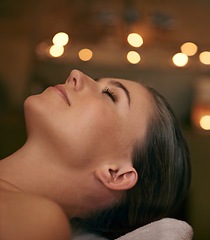 Image showing Woman, spa and candle with luxury, relax and peace with wellness and bokeh. Person, skincare and health for zen, calm and body care at resort or massage parlour and serene ambience and treatment