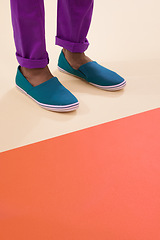 Image showing Male model, shoes and footwear for fashion, floor and feet with mock up space and colourblock background. Contemporary, stylish and trendy for black man person, classic or comfortable sneaker design