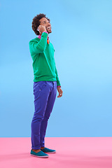 Image showing Fashion, black man and happy in studio with color block in clothes for trendy, style and outfit. Male person, stylist and fashionable for season trends with smile for funky, edgy and formal wear.