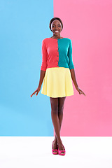Image showing Fashion, studio or portrait of black woman with color block, trendy and stylish outfit with smile. Unique, different or happy African model with edgy, classy or retro style for cool vintage aesthetic
