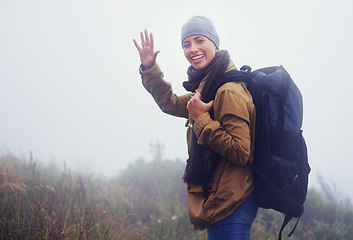 Image showing Happy woman, hiking and portrait in nature with wave and greeting for morning adventure in mountain. Healthy person, positive and face in outdoor exercise and walk for journey in sweden countryside