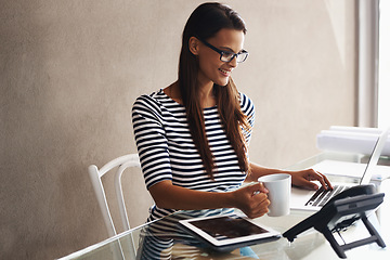 Image showing Woman, desk and laptop with blueprints for interior design or creative career, happy and working on project with computer. Online, search and plan project with digital technology and information