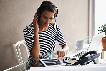 Image showing Woman, home and office with tablet, headphones and listening to customer while working on touchscreen for call center job. Telecommunications, service or online with headset for consulting with crm