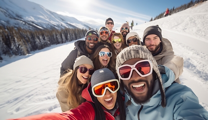 Image showing Friends capture snowy mountain joy in a cheerful group selfie amid the wintry alpine landscape.