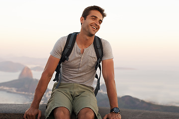 Image showing Smile, travel and backpacking with man in Brazil as tourist for adventure, holiday or sightseeing. Destination, location and vacation in Rio de Janeiro with happy young person outdoor to explore