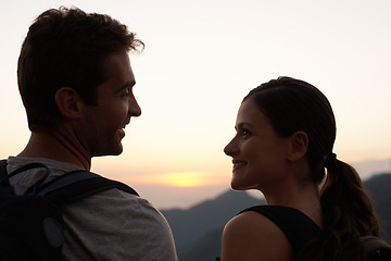Image showing Hiking, love and happy couple on vacation at sunset with smile for holiday, support or sightseeing. Back, tourism and romantic man with a woman on outdoor adventure travel in Rio de Janeiro, Brazil