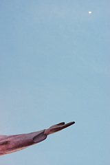 Image showing Jesus christ, hand and statue for religious faith, sculpture and art in rio de janeiro. Symbol, peace and history monument for tourism attraction, spiritual and christian journey on blue background