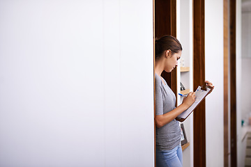 Image showing Home, woman and writing with clipboard for checklist with pen for notes and organize paperwork. Housewife, mockup and invoice with document for information with schedule, costs and grocery payment