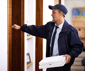 Image showing Delivery, man and pizza at front door to home of customer, giving a box and easy service. Ecommerce, courier and person with fast food, takeaway and transport in supply chain of package to house