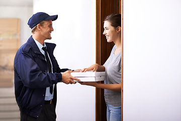 Image showing Pizza, delivery and man with customer in home, giving a box and easy service to front door. Ecommerce, courier and happy woman with fast food, takeaway order and thank you for transport of package